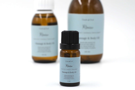 A 10ml bottle of Renew aromatherapy massage oil, with a blend of peppermint, rosemary, and black pepper essential oils. Formulated to ease muscle tension and promote healthy circulation.