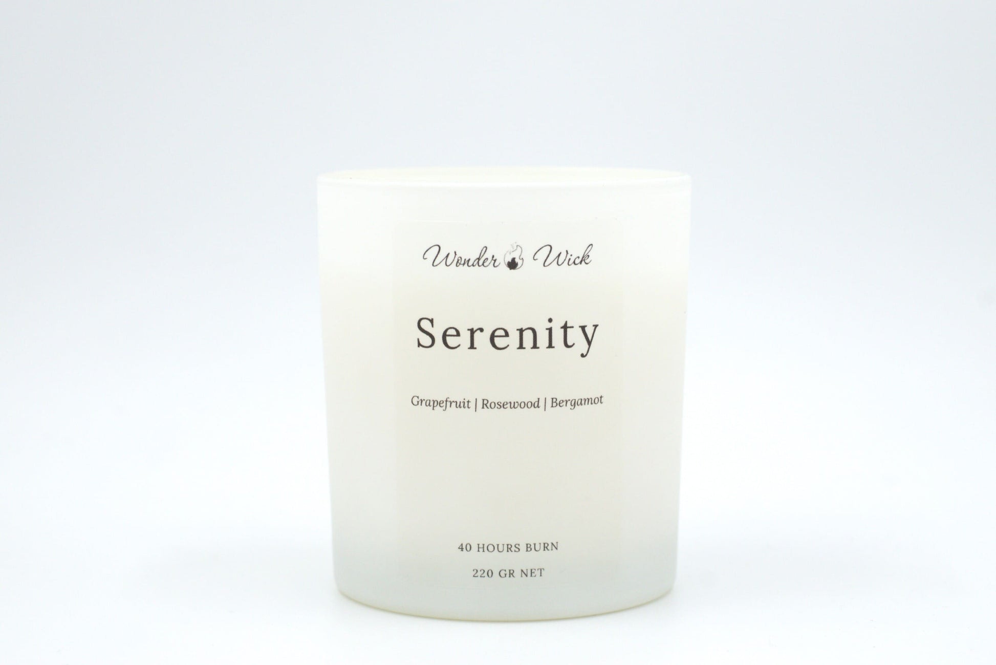 Serenity candle 220g without lid, showcasing a bright, mood-lifting grapefruit, bergamot, and rosewood scent.