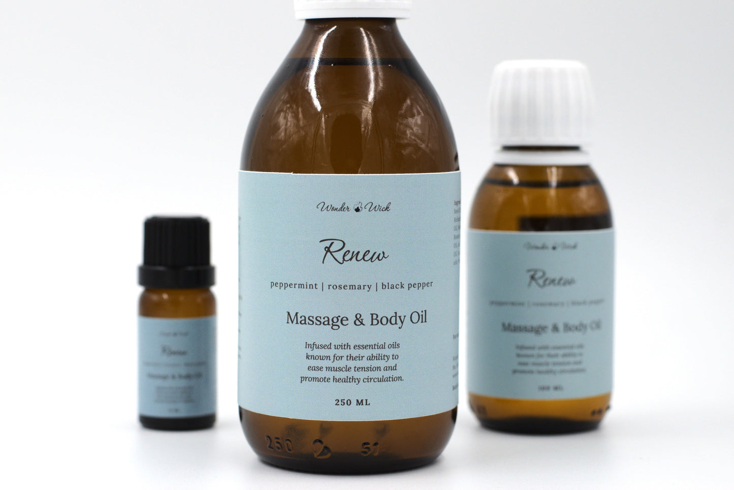 Renew massage oil for sore muscles (250 ml) with peppermint, rosemary, and black pepper essential oils, displayed with a 10 ml sample bottle, perfect for soothing sore muscles and enhancing blood flow.