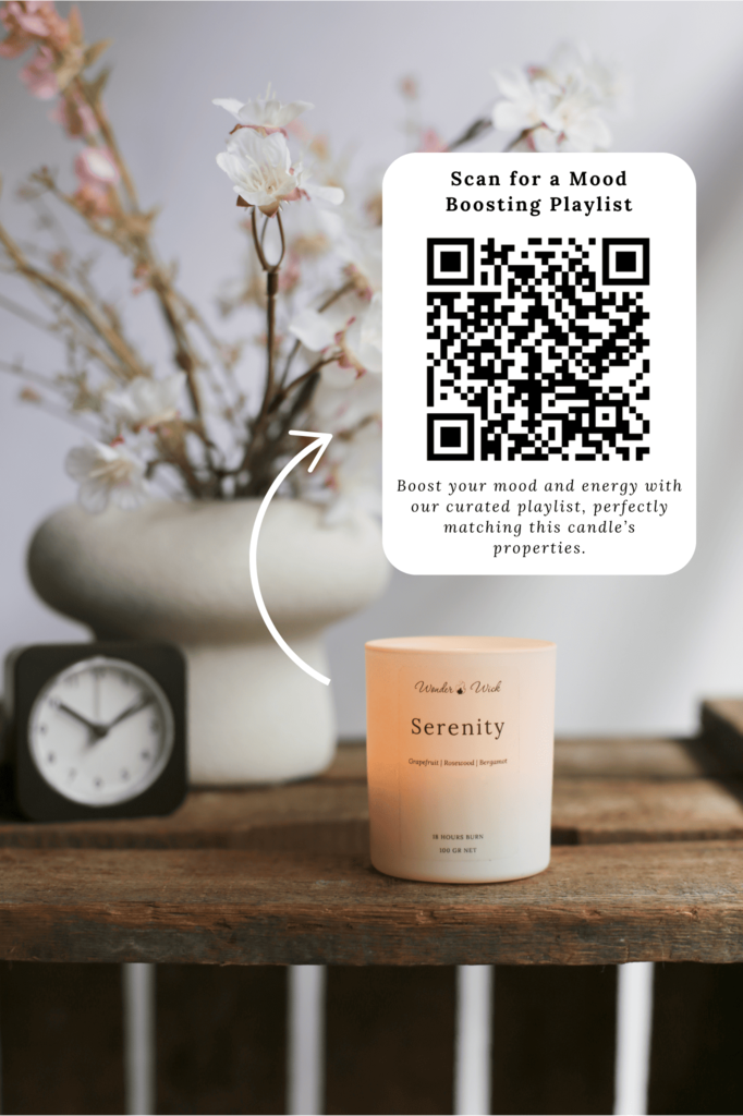 Wonder Wick Serenity candle displayed with a QR code for a mood-boosting playlist. The candle is set on a rustic table alongside a clock and flowers, creating a calming ambiance. The QR code invites users to scan for a playlist that enhances the candle's mood-boosting properties.